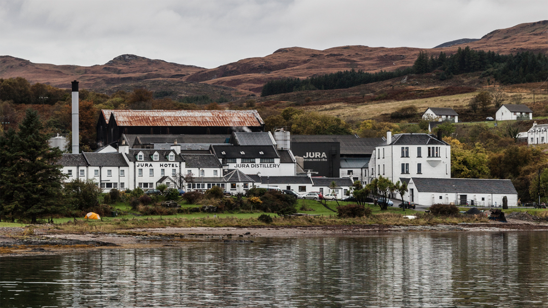 Jura distillery on the Isle of Jura, Scotland, viewed from Craighouse harbour