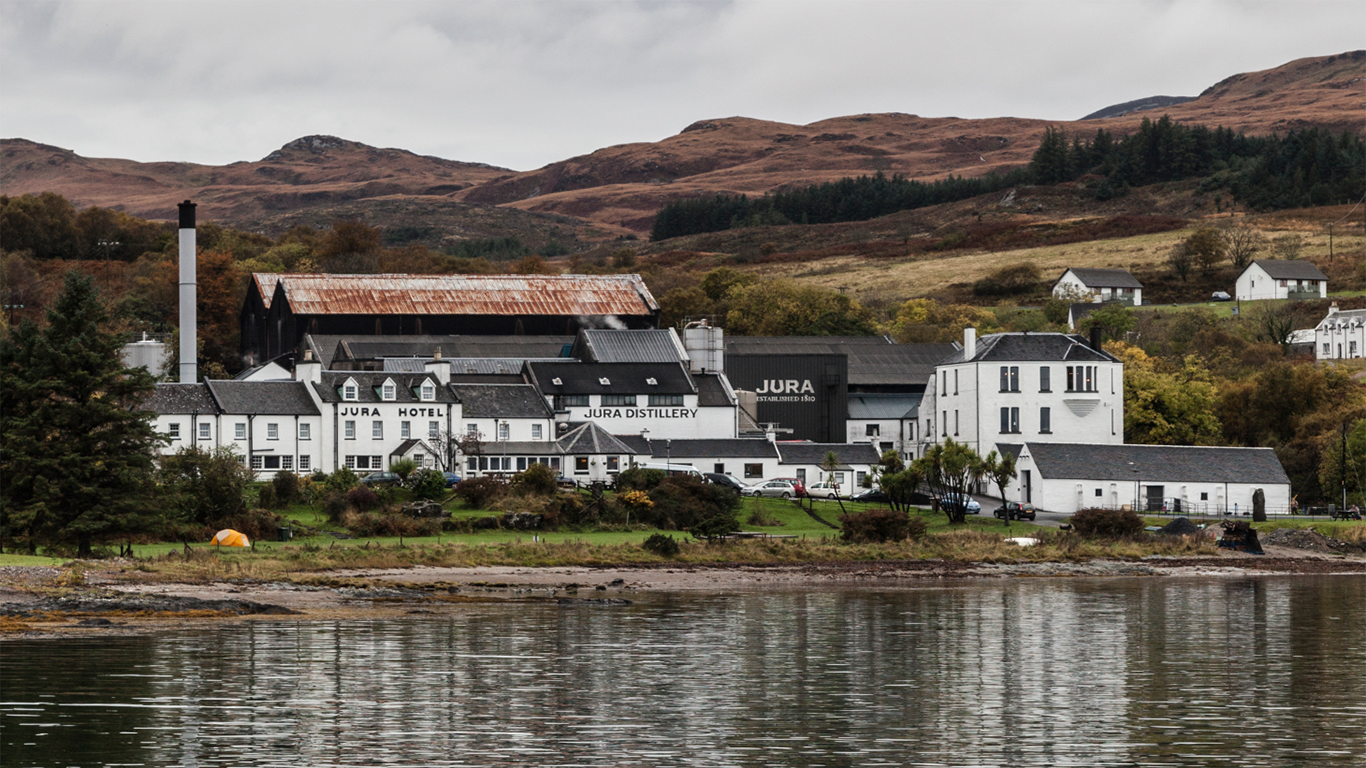 Jura distillery on the Isle of Jura, Scotland, viewed from Craighouse harbour