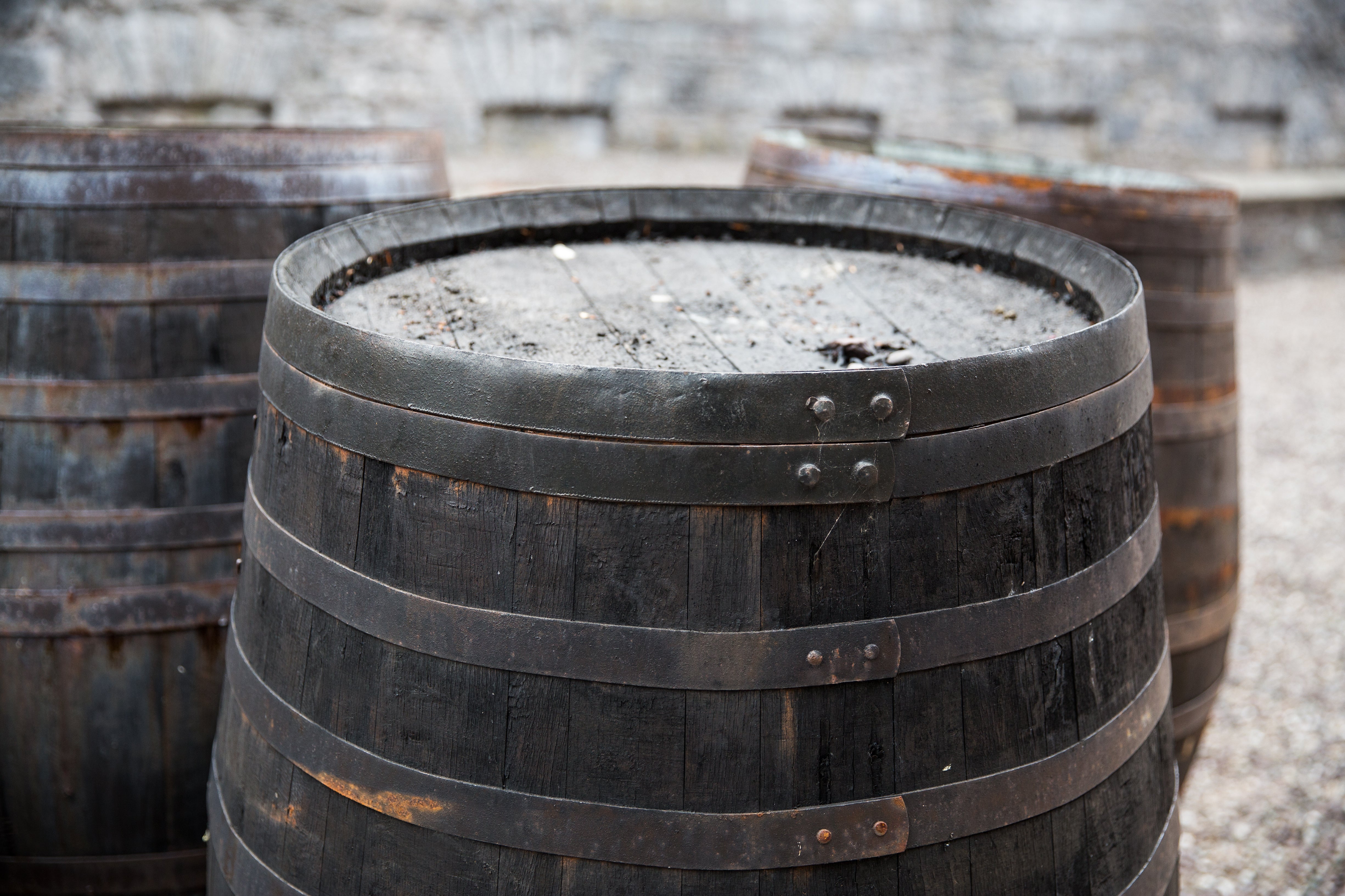 An old barrel filled with whisky.