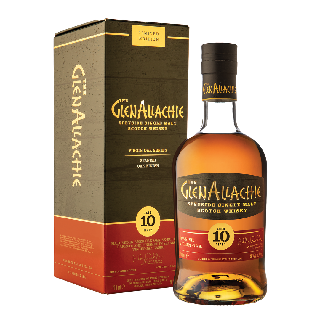 A bottle of GlenAllachie 10 Year Old Spanish Virgin Oak Single Malt Scotch Whisky stands beside its limited edition green and gold box, which features red and yellow accents and text highlighting its Spanish Virgin Oak finish.