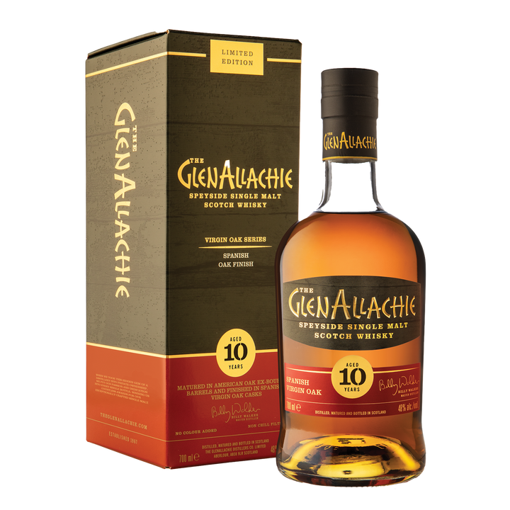 A bottle of GlenAllachie 10 Year Old Spanish Virgin Oak Single Malt Scotch Whisky stands beside its limited edition green and gold box, which features red and yellow accents and text highlighting its Spanish Virgin Oak finish.