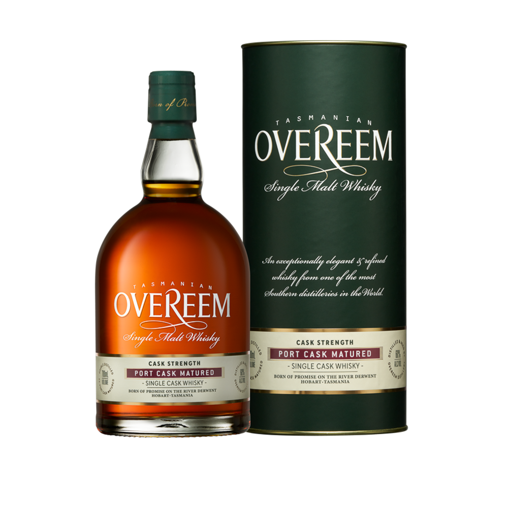 A bottle of Overeem Port Cask Matured - Cask Strength Australian Single Malt Whisky stands next to its matching green cylindrical box, both labeled cask strength and port cask matured. The amber spirit suggests rich flavors within.