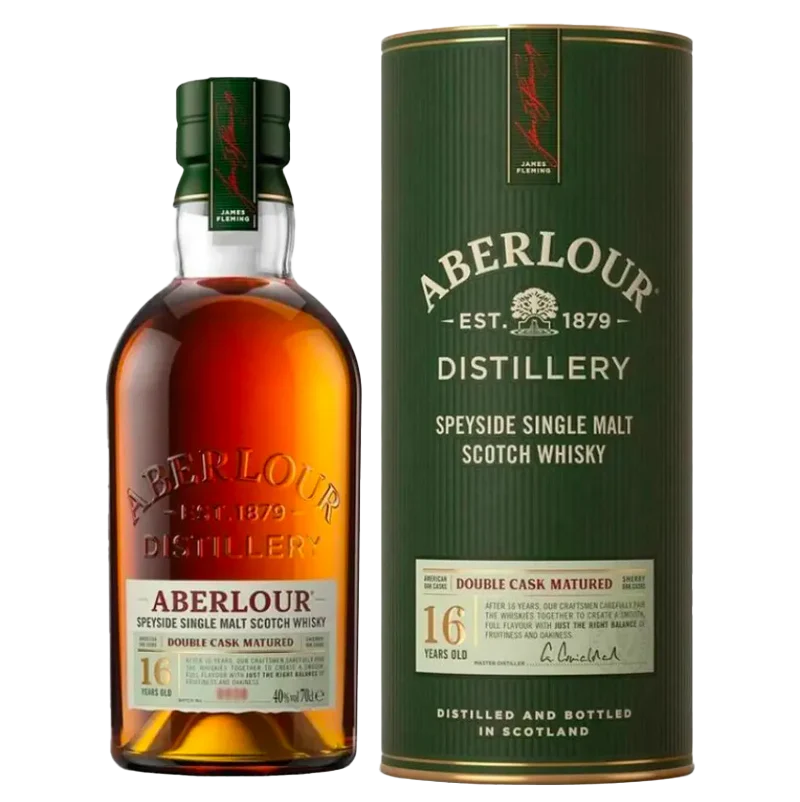 A bottle of Aberlour 16 Year Old Double Cask Single Malt Scotch Whisky stands beside its cylindrical box, both adorned with gold, cream, and green labels featuring red accents that highlight its renowned double cask maturation.