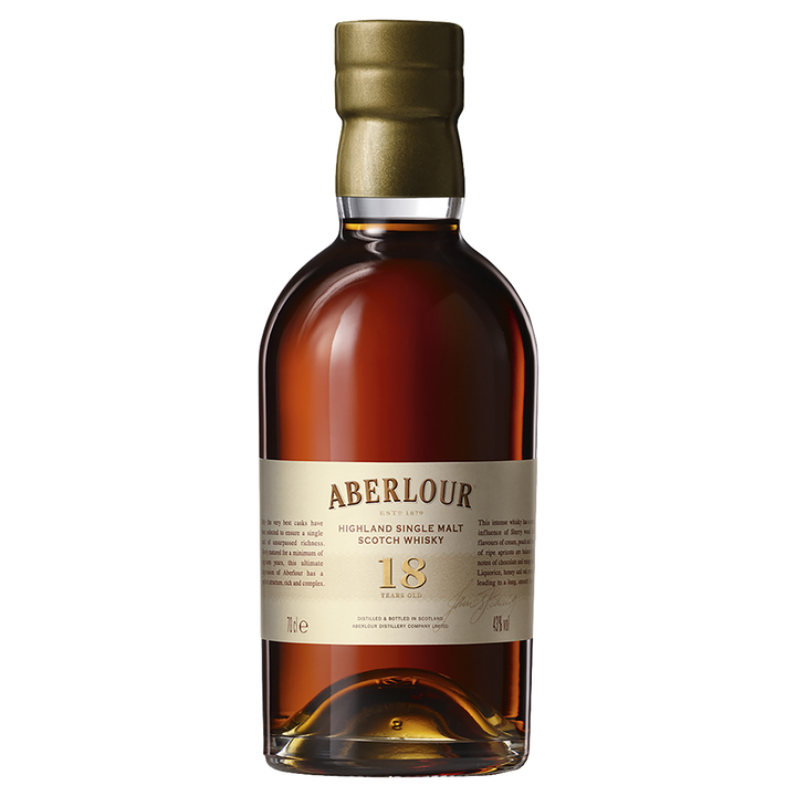A bottle of Aberlour 18 Year Old Single Malt Scotch Whisky with a gold foil cap and cream label. The deep amber whisky inside offers exceptional depth and character.