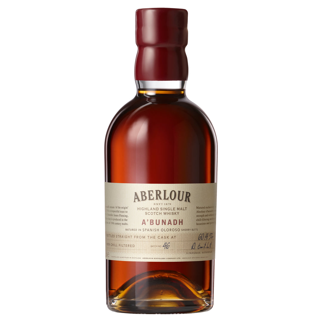 A bottle of Aberlour A’bunadh Single Malt Scotch Whisky featuring deep amber liquid, a cream label with handwritten details, a burgundy wax-sealed cap, and cask strength single malt notes.