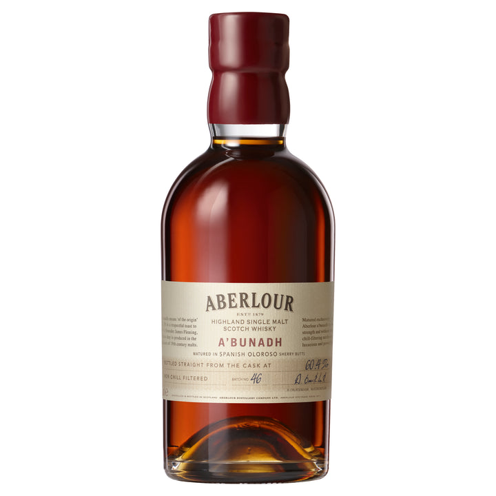 A bottle of Aberlour A’bunadh Single Malt Scotch Whisky featuring deep amber liquid, a cream label with handwritten details, a burgundy wax-sealed cap, and cask strength single malt notes.