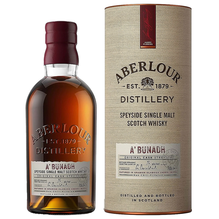 A bottle of Aberlour A’bunadh Single Malt Scotch Whisky stands by its cylindrical packaging, both featuring the brand name and whisky details. This cask strength whisky offers rich, bold flavor and sherry cask character.