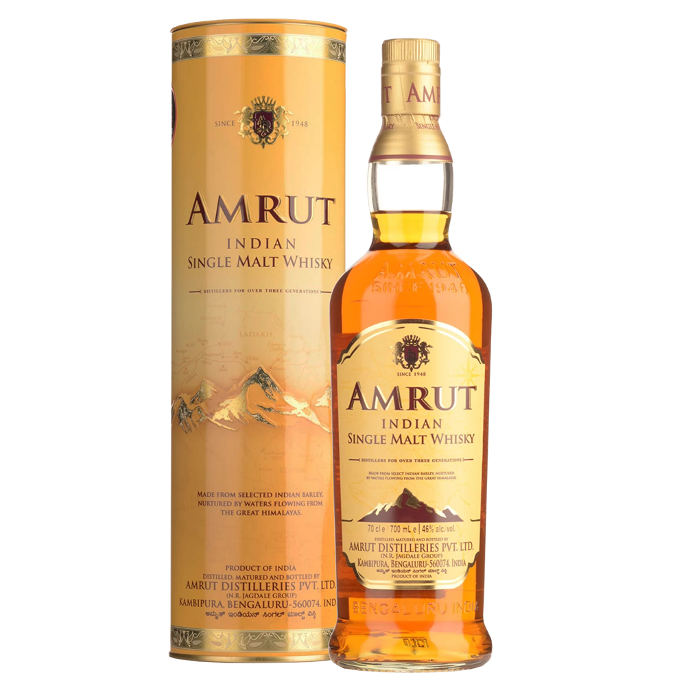 A bottle of Amrut Indian Single Malt Whisky stands beside its gold and brown cylindrical packaging, both displaying mountain designs and text showcasing the Amrut brand and its Indian whisky origins.