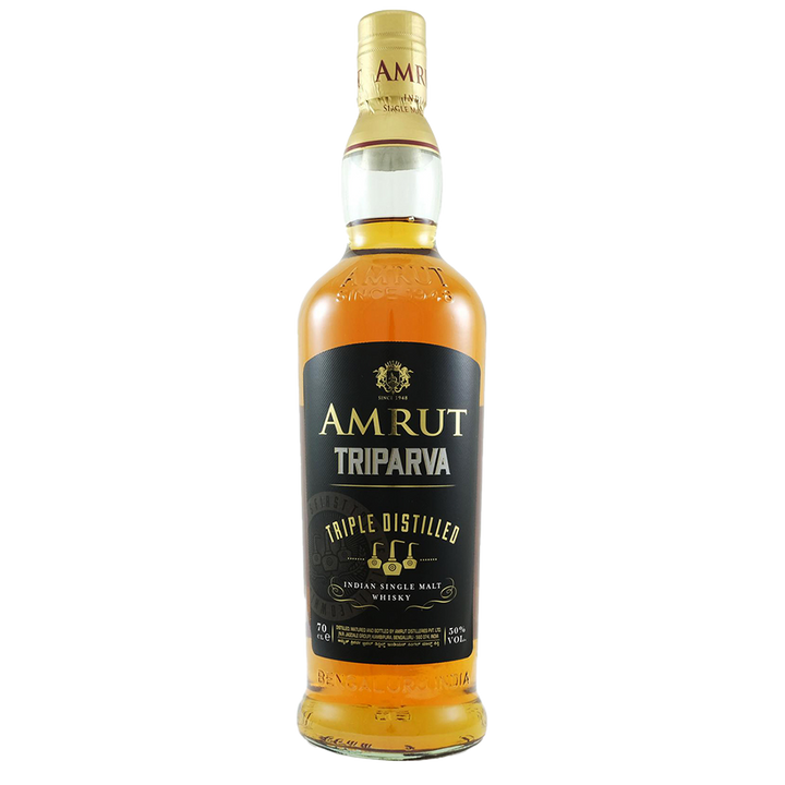 A bottle of Amrut Triparva Indian Single Malt whisky, featuring triple distillation and a black-and-gold label with elegant gold accents, is shown against a plain white background.