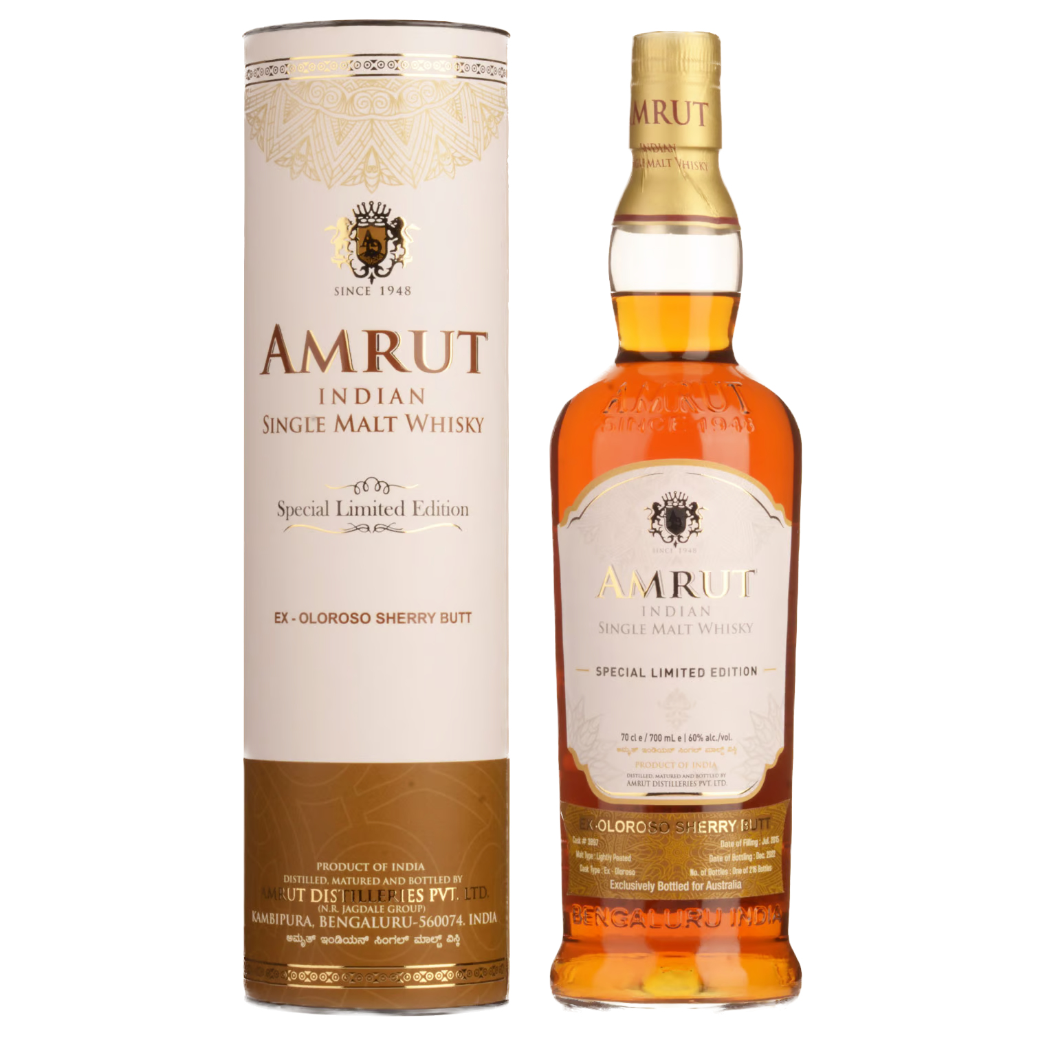 A bottle of Amrut Oloroso Cask #3897 Indian Single Malt Whisky stands beside its matching cylindrical box, both adorned with gold and brown details emphasizing its sherry cask-aged character.