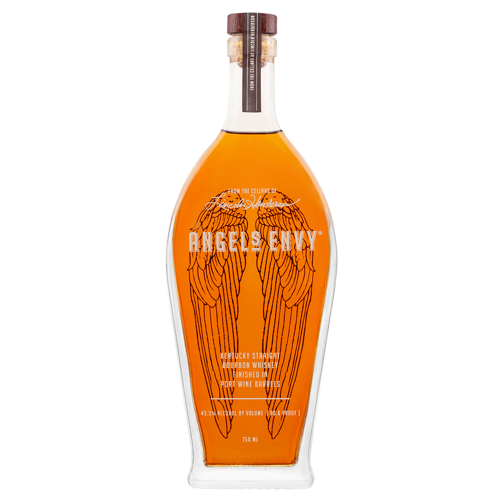 A clear glass bottle of Angel's Envy Kentucky Straight Bourbon Whiskey, with an amber liquid, angel wings on the label, a wooden cap, and finished in port wine casks, set against a plain white background.