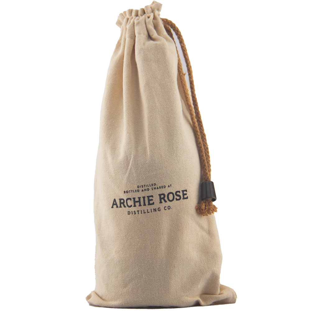 A beige drawstring cloth bag with “Archie Rose Distilling Co.” in black on the front stands upright against a plain background—perfect for gifting or presenting Archie Rose Chocolate Rye Malt Whisky 700ml.