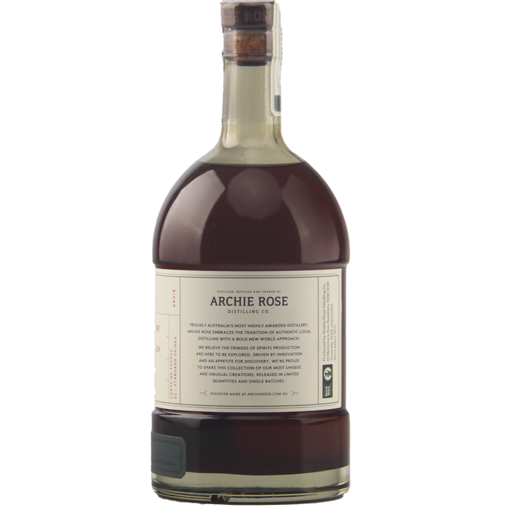 A 700ml glass bottle of Archie Rose Ironbark Smoked Rye Malt Whisky, featuring dark brown liquid, a cream label, and wax-sealed cap, is displayed against a white background—this limited-edition release stands out.
