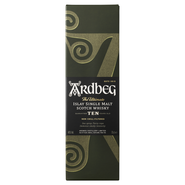 A green and gold box of Ardbeg 10 Year Old Single Malt Scotch Whisky with bold decorative swirls, the brand name in large white letters, and details noting it is non chill-filtered and aged 10 years.