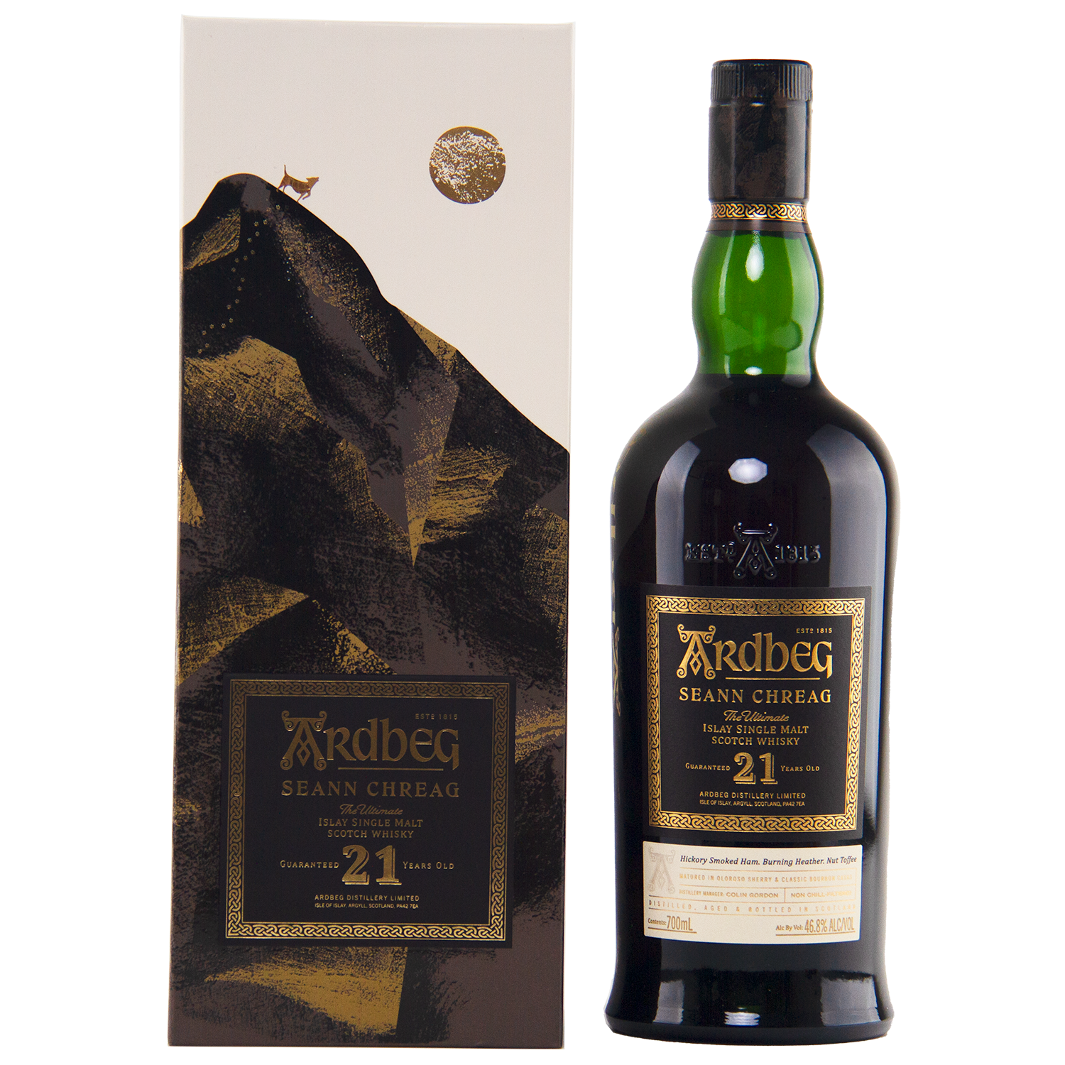A bottle of Ardbeg 21 Year Old Seann Chreag Single Malt Scotch Whisky stands beside its decorative box, adorned with an abstract mountain design and gold accents. The label highlights the whisky’s name and limited 21-year age statement.