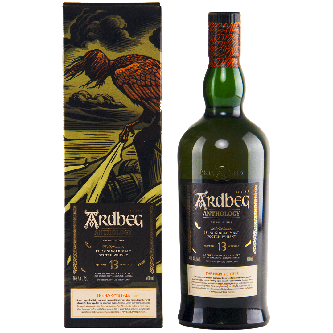 A bottle of Ardbeg Anthology The Harpy’s Tale Very Rare 13 Year 700ml stands next to its decorative box, which features an illustrated bird perched on a branch against a dramatic landscape backdrop.