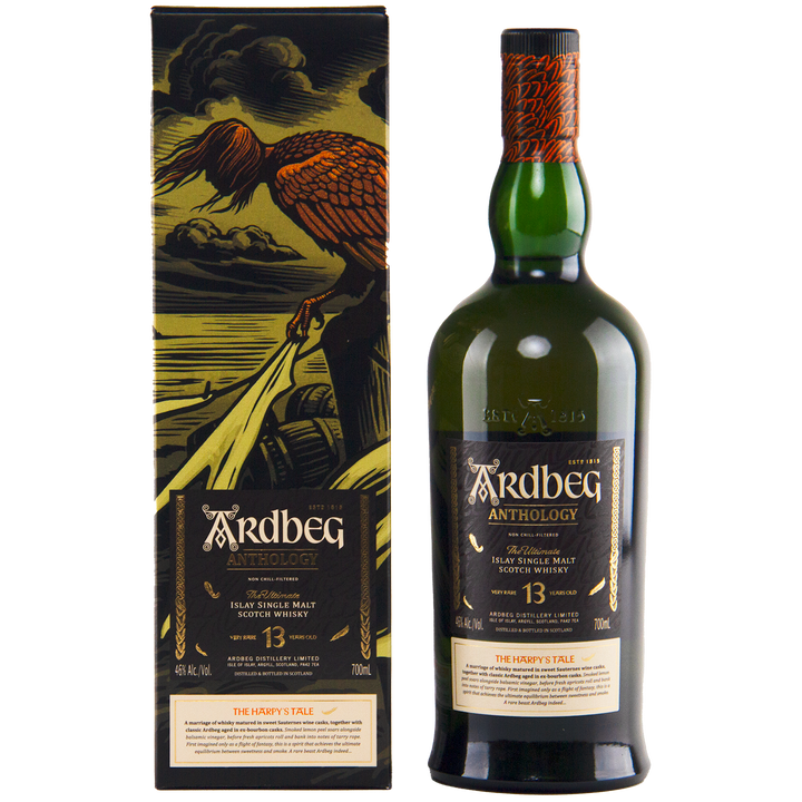 A bottle of Ardbeg Anthology The Harpy’s Tale Very Rare 13 Year 700ml stands next to its decorative box, which features an illustrated bird perched on a branch against a dramatic landscape backdrop.
