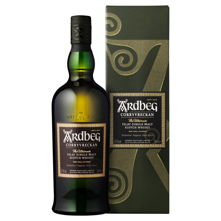 A bottle of Ardbeg Corryvreckan Single Malt Scotch Whisky stands beside its matching box, both showcasing bold lettering and swirling patterns in dark green and gold.