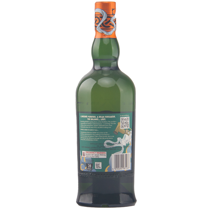 A green glass bottle of Ardbeg Heavy Vapours Committee Release is shown from the back. Its label features text, a QR code, a government warning, and an octopus with waves—this limited release single malt is topped with a colorful cap.