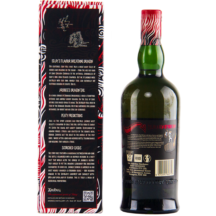 A bottle of Ardbeg Scorch Single Malt Scotch Whisky Ardbeg Day 2021 Limited Release, with a green neck and black label, stands by its box decorated with red, black, and white flames that highlight this peaty whisky’s bold character.