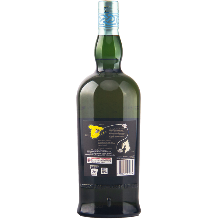 A green glass Ardbeg Smoketrails Manzanilla Edition 700ml bottle is shown from the back, with a label featuring a yellow map, text, graphics, and a light blue patterned cap—exclusive to travel retail.