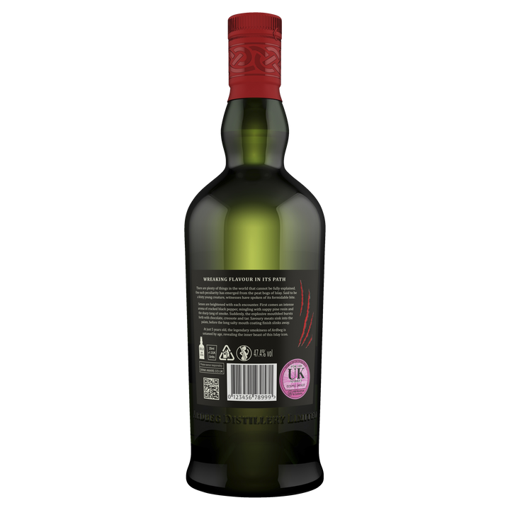 A green glass bottle of Ardbeg 5 Year Old Wee Beastie Single Malt Scotch Whisky with a red cap is shown from the back. The white-labeled bottle features various symbols, a barcode, a pink UK duty stamp, and sits against a light plain background.