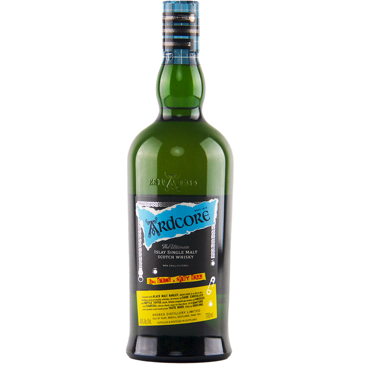 A green bottle of Ardbeg Ardcore Single Malt Scotch Whisky Ardbeg Day 2022 Limited Release, featuring a blue, black, and yellow label and a black cap with blue and silver stripes, stands upright on a plain white background.
