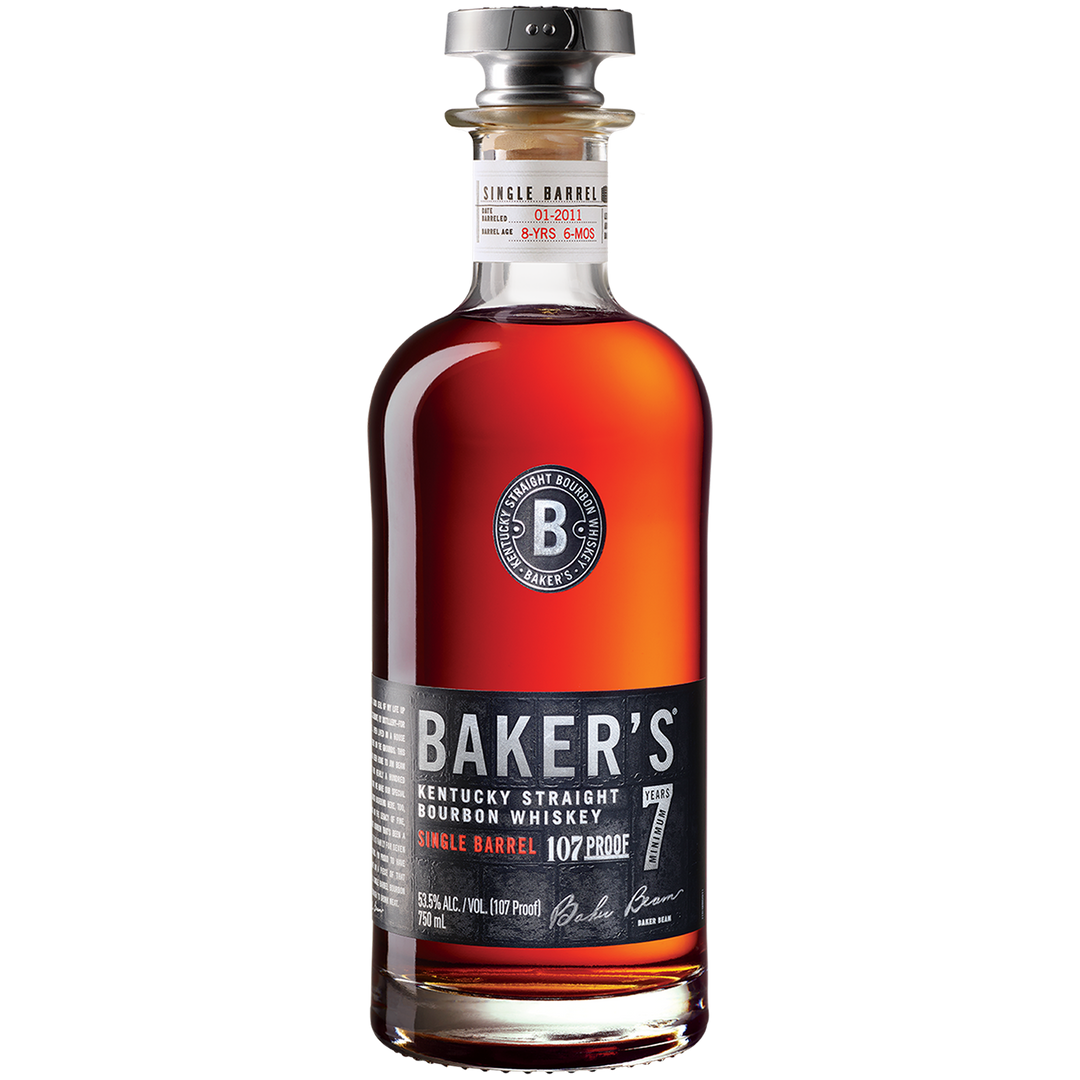 A bottle of Baker’s 7 Year Old Single Barrel Bourbon features rich amber bourbon in clear glass with a black and silver label and silver cap, displayed against a plain white background.