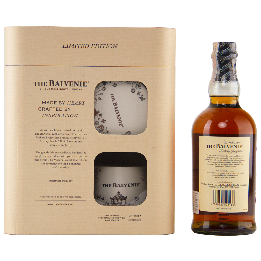 The Balvenie 12 Year Old DoubleWood Vietnam Limited Edition Gift Set includes single malt Scotch whisky and two branded glasses in a beige display box, with the bottle label uniquely facing backward.