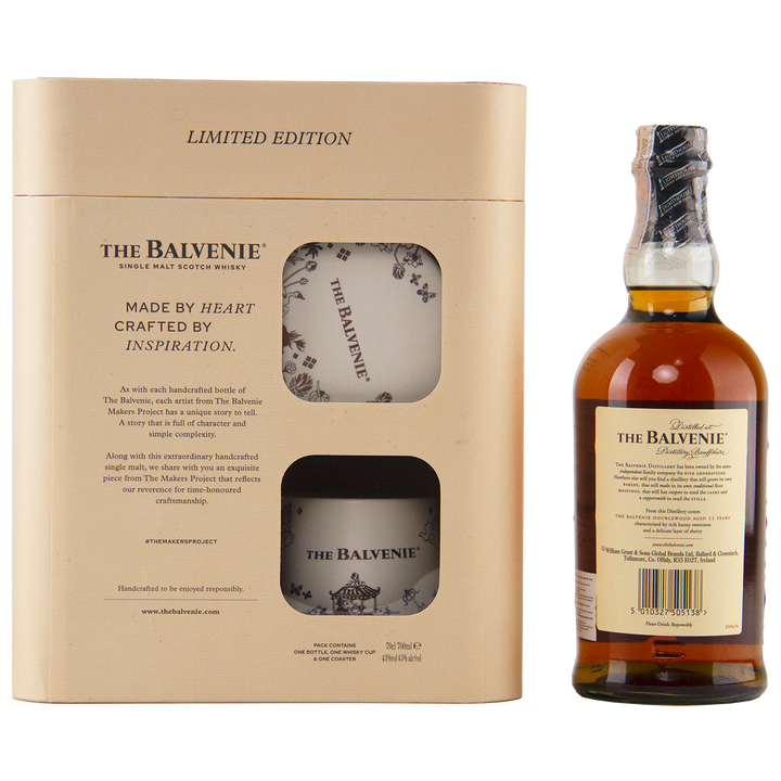 The Balvenie 12 Year Old DoubleWood Vietnam Limited Edition Gift Set includes single malt Scotch whisky and two branded glasses in a beige display box, with the bottle label uniquely facing backward.