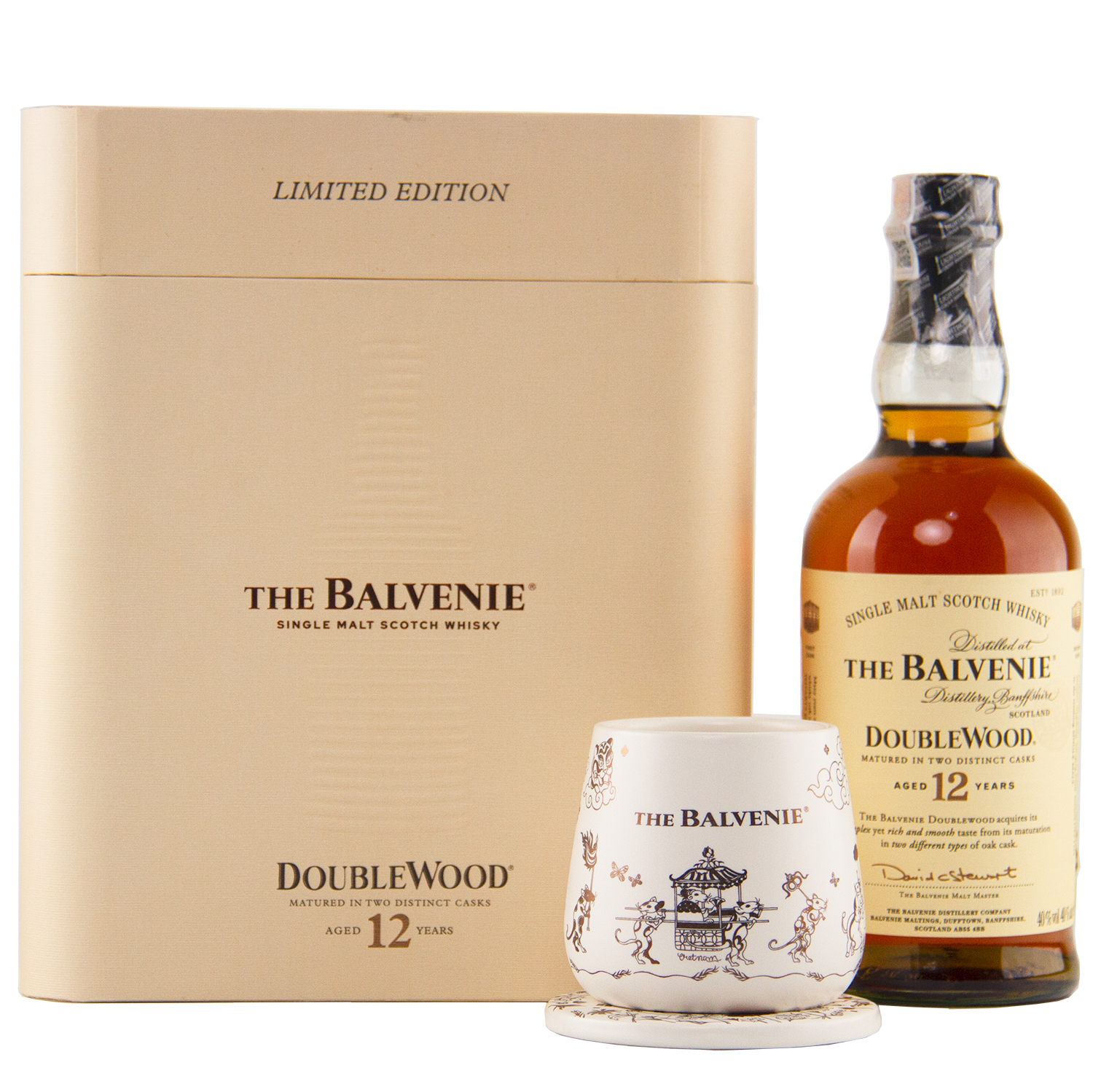 The Balvenie 12 Year Old DoubleWood Vietnam Limited Edition Gift Set includes a bottle of single malt Scotch whisky, a decorative glass, and cream-colored packaging.