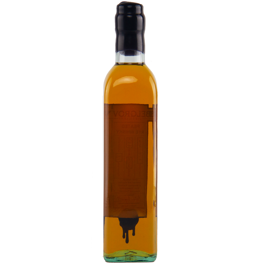 Bottle of amber liquid with a black cap on a white background