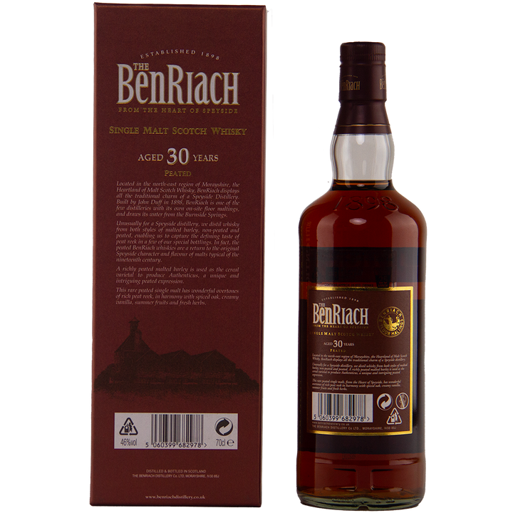 A bottle of Benriach Authenticus Peated 30 Year Old stands beside its maroon box, both featuring gold and white text that showcases the Speyside single malt’s age and branding.