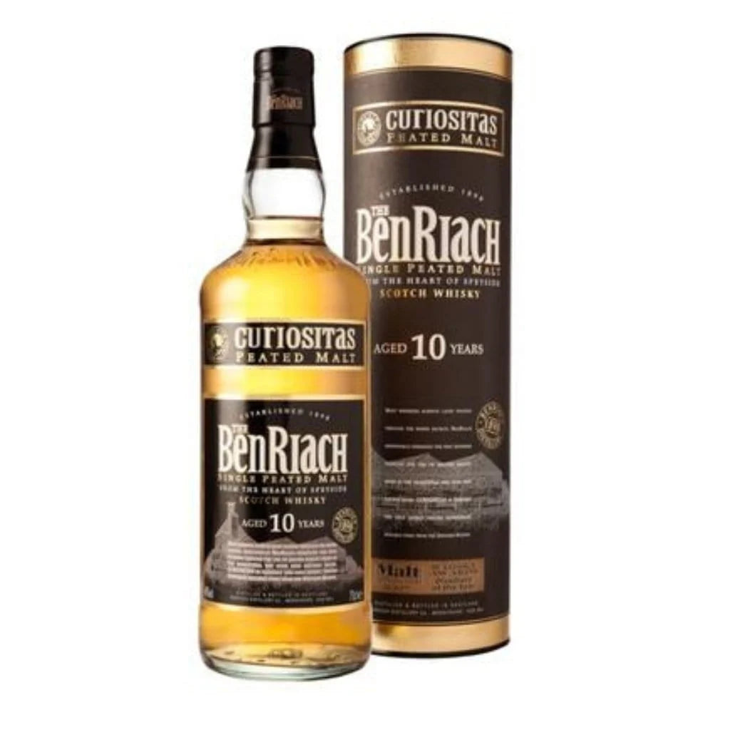 A bottle of Cutiositas BenRiach Aged 10 Years Single Flated Malt Scotch Whisky next to its cylindrical packaging box, shown on a plain white background.