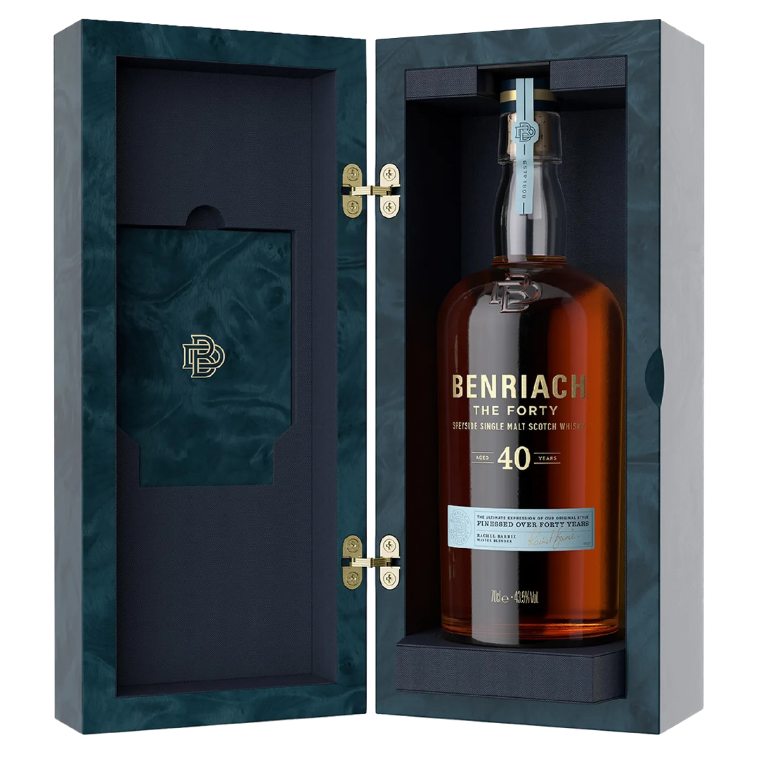A bottle of Benriach The Forty Single Malt Scotch Whisky stands upright in an open, elegant blue box featuring gold hinges and the Benriach logo on the inside lid.