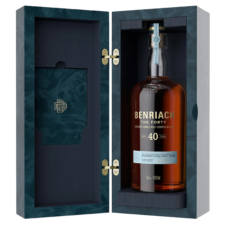 A bottle of Benriach The Forty Single Malt Scotch Whisky stands upright in an open, elegant blue box featuring gold hinges and the Benriach logo on the inside lid.