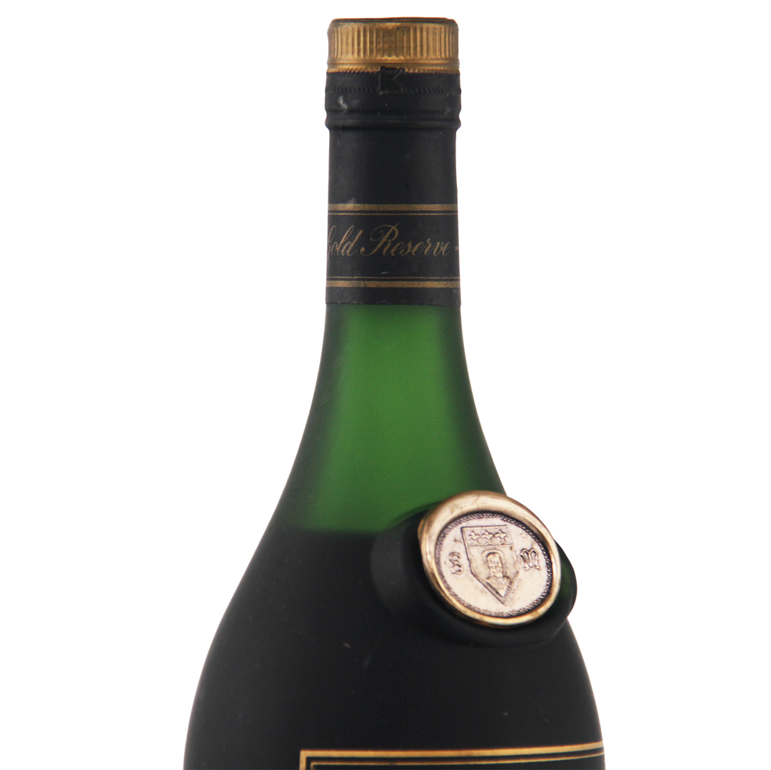 Green wine bottle with gold cap and label on a white background