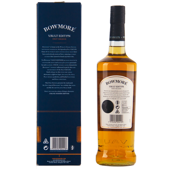 A bottle of Bowmore Vault Edition Atlantic Sea Salt (First Release) Single Malt Scotch Whisky stands beside its blue box, both displaying the No.1 Vaults name and crisp white labels. The whisky inside gleams with a rich amber hue.