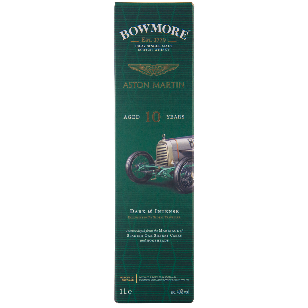 Green box packaging for Bowmore 10 Year Old Aston Martin Edition 7 Single Malt Scotch Whisky, featuring a vintage racing car, gold text highlighting its age, dark and intense flavor, 1L size, and limited edition status.