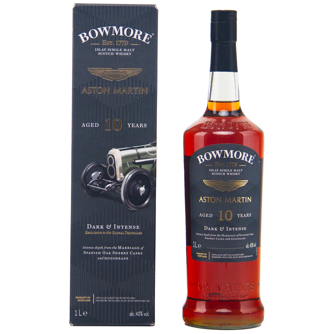 A bottle of Bowmore 10 Year Old Aston Martin Edition #4 Single Malt Scotch Whisky stands beside its branded box, both with gold and black labels featuring "Aged 10 Years" and dynamic car imagery on the box.