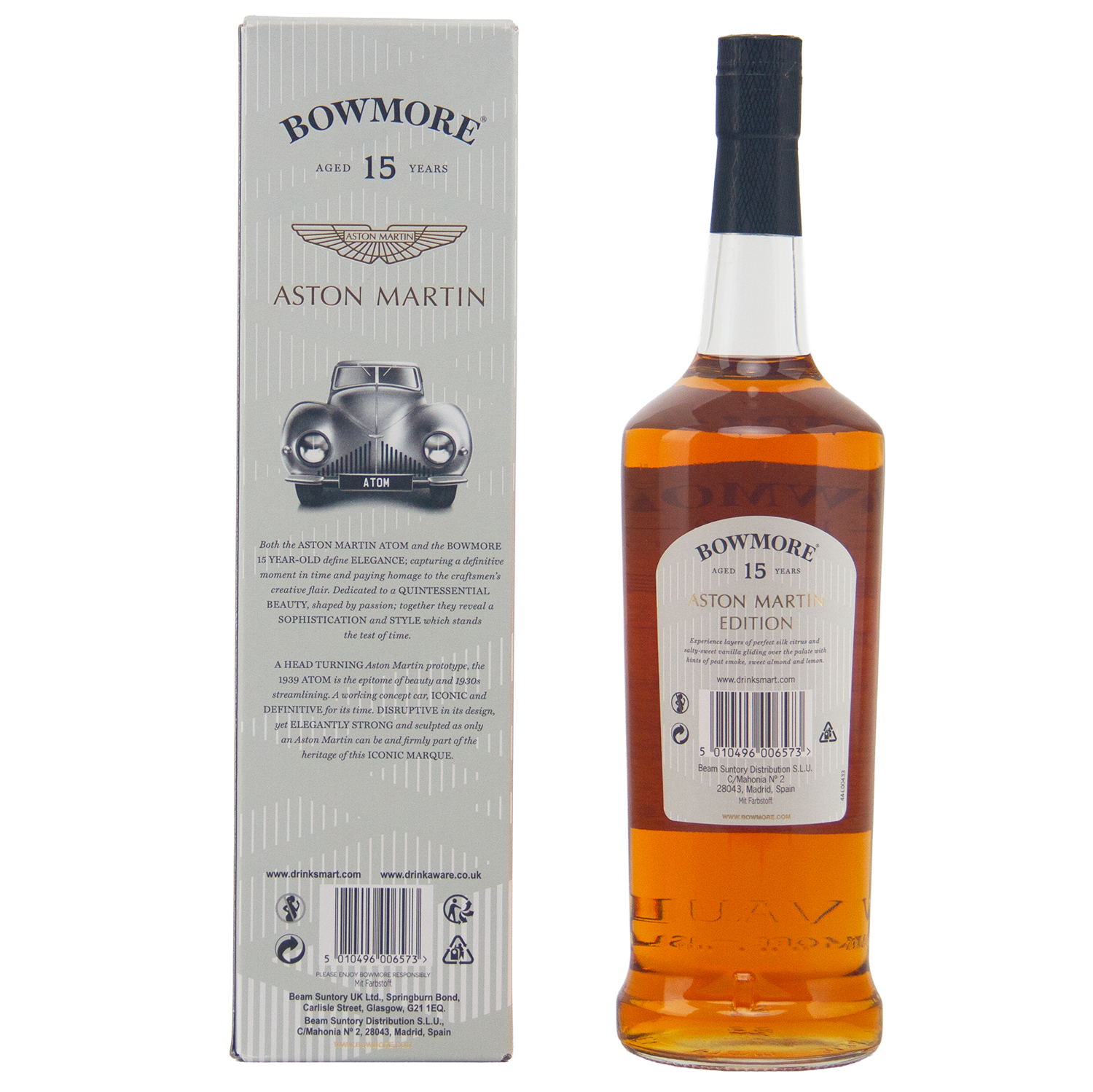 A bottle of Bowmore 15 Year Old Aston Martin Edition #2 Single Malt Scotch Whisky stands beside its box, which displays a classic Aston Martin car illustration and detailed product information.