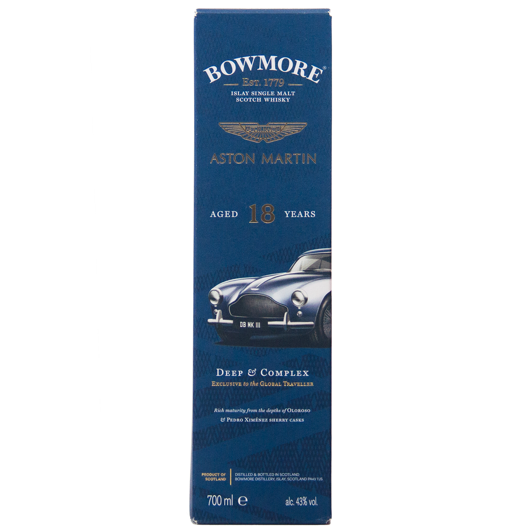 A blue box of Bowmore 18 Year Old Aston Martin Edition #3 Single Malt Scotch Whisky, with a silver classic car image, gold and white text, and notes on the whisky’s depth and complexity.