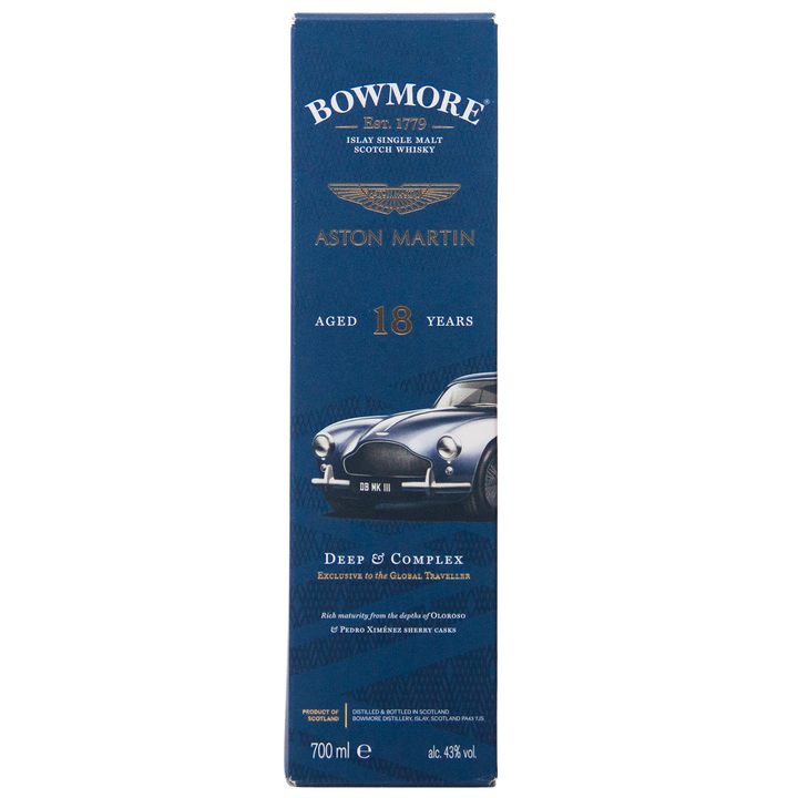 A blue box of Bowmore 18 Year Old Aston Martin Edition #3 Single Malt Scotch Whisky, with a silver classic car image, gold and white text, and notes on the whisky’s depth and complexity.
