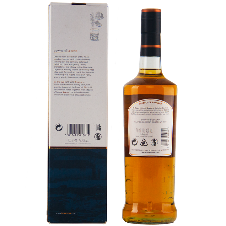 A bottle of Bowmore Legend Islay Single Malt Scotch Whisky and its box are displayed side by side, showing their back labels with product details, barcodes, and branding against a white background.