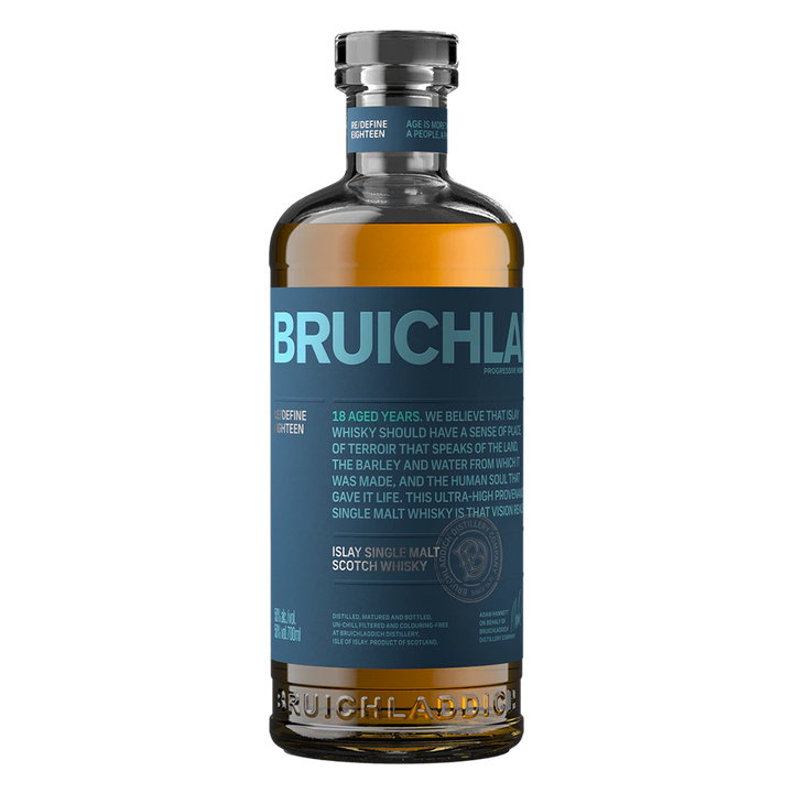 A bottle of Bruichladdich 18 Year Old Single Malt Scotch Whisky with a blue label, clear glass, and amber liquid stands against a plain white background.
