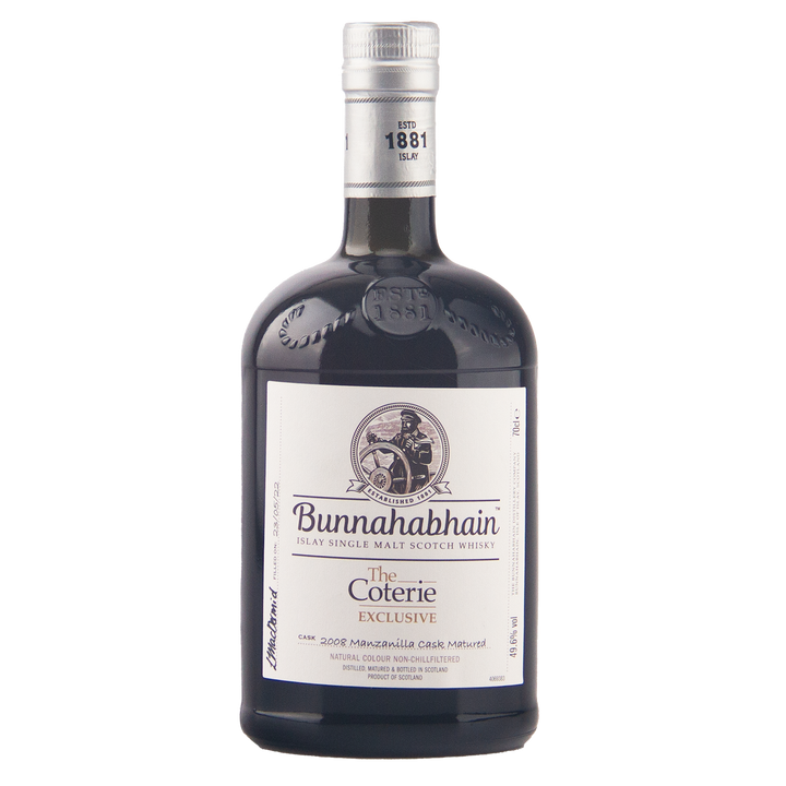 A bottle of Bunnahabhain The Coterie Exclusive single malt scotch whisky on a plain white background.