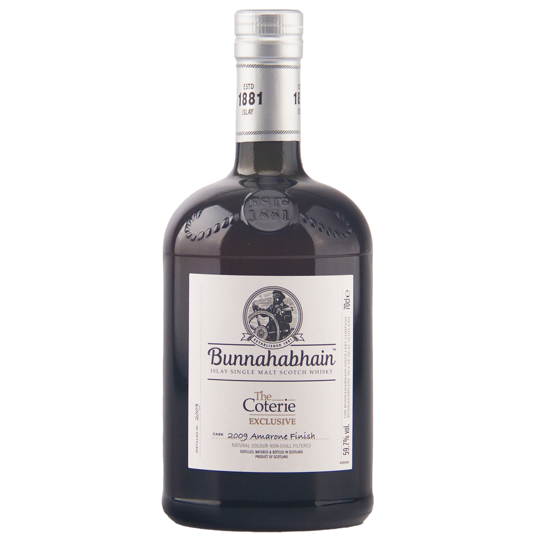 A bottle of Bunnahabhain The Coterie Exclusive 2005 Ammunted Finish single malt Scotch whisky on a plain white background.