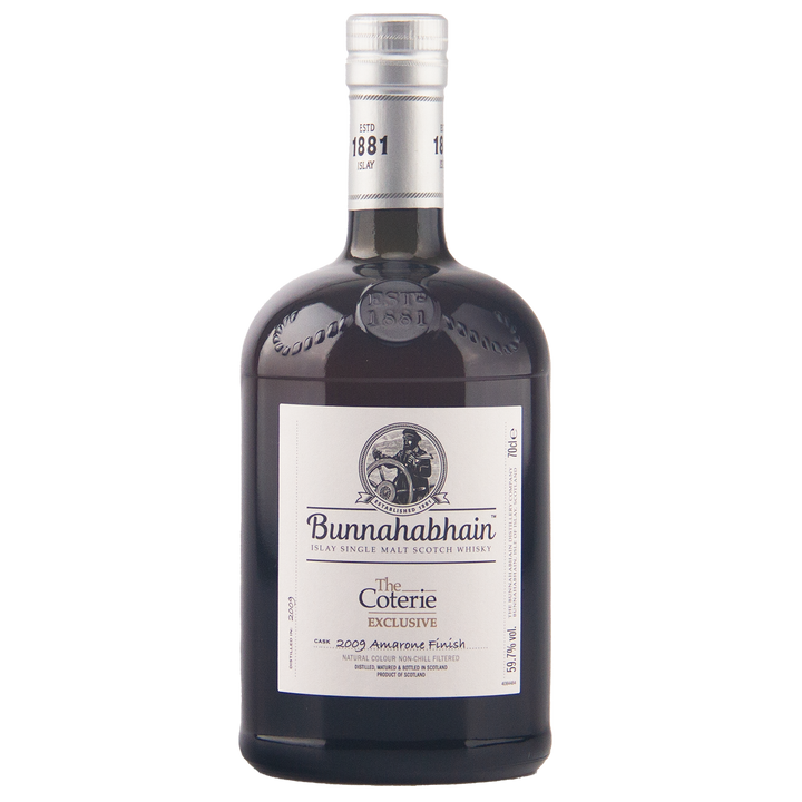 A bottle of Bunnahabhain The Coterie Exclusive 2005 Ammunted Finish single malt Scotch whisky on a plain white background.