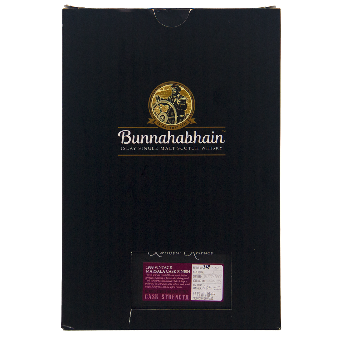 A sleek black box with the gold Bunnahabhain Single Malt Whisky logo and a small label reading “1988 Vintage Marsala Cask Finish Cask Strength”—a fitting presentation for the Bunnahabhain 30 Year Old 1988 Vintage.