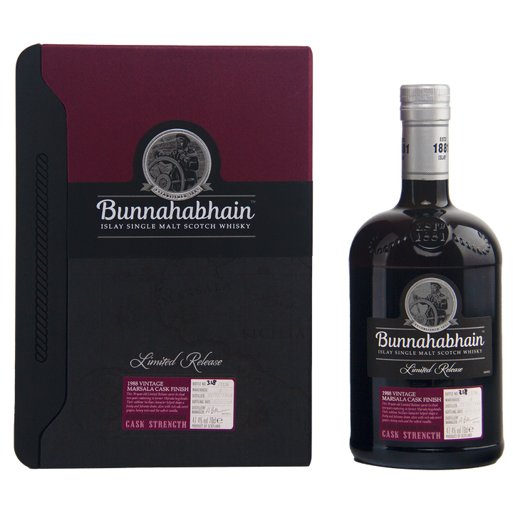 A bottle and box of Bunnahabhain 30 Year Old 1988 Vintage single malt whisky, with a maroon and black design, silver accents, and the distillery logo on both the bottle and the box.